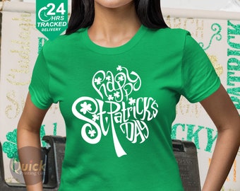 May include: A green t-shirt with a white shamrock design that says "Happy St. Patrick's Day".