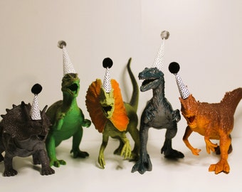 Dinosaurios personalizados con sombreros de fiesta