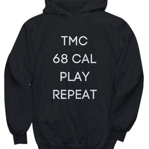 May include: Black hooded sweatshirt with white text that reads "TMC 68 CAL PLAY REPEAT"