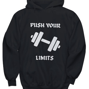 May include: Black hooded sweatshirt with a white graphic of a dumbbell and the text "PUSH YOUR LIMITS" in a gothic font.