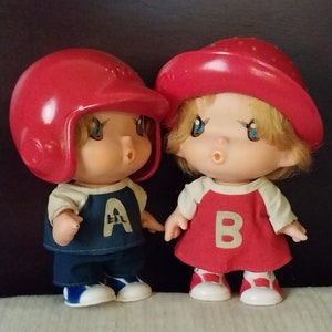 Two Vintage Sekiguchi dolls; Baseball and Strawberry theme; Great Condition