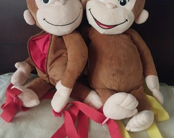 Curioso come George con pigiama e orsacchiotto, peluche da applausi -   Italia