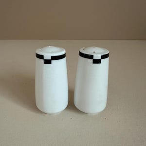 1990s Mikasa Midnight black and white salt and pepper shakers, sold as a pair