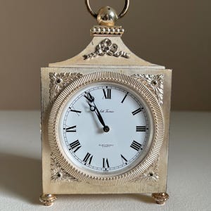 1950s ornate Seth Thomas brass clock with gold finish