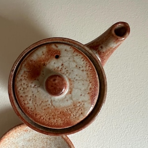 1990s Shino-yaki handcrafted stoneware handleless teapot with lid and saucer
