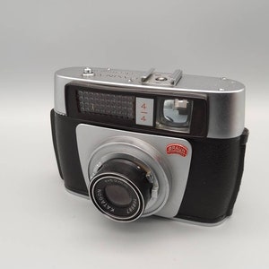 Braun Paxina electromatic camera. Lens katagon 50mm. Braun Nuremberg in good condition.
