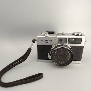 Mamiya 135 EE Camera lens 35mm. Rare. WORLDWIDE SHIPPING.