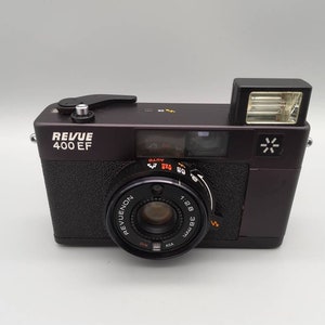 Revue 400 ef camera lens revuenon 38 mm. Good working condition. WORLDWIDE SHIPPING.