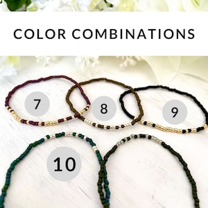 May include: Four beaded bracelets in different color combinations. The bracelets are numbered 7, 8, 9, and 10. The bracelets are made with small, round beads in various colors, including gold, black, brown, purple, and green.
