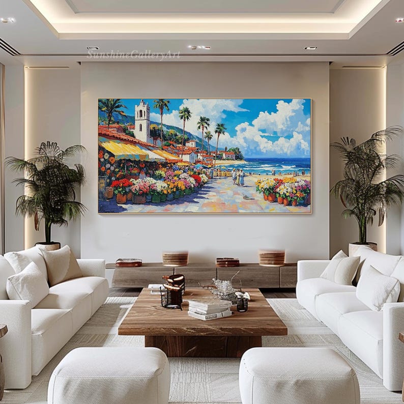 May include: A colorful painting of a seaside town with a white church, palm trees, and a beach with people walking along the shore.