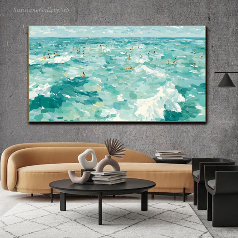May include: An abstract painting of a turquoise ocean with white waves and numerous figures on surfboards. The artwork, framed in a dark wood, evokes a sense of movement and the joy of surfing. The text "SunshineGalleryArt" is in the upper left corner.