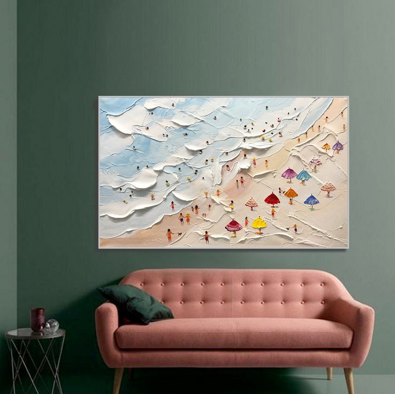 May include: A painting depicting a beach scene with white waves, blue sky, and colourful umbrellas. People are shown in the painting, enjoying the beach.