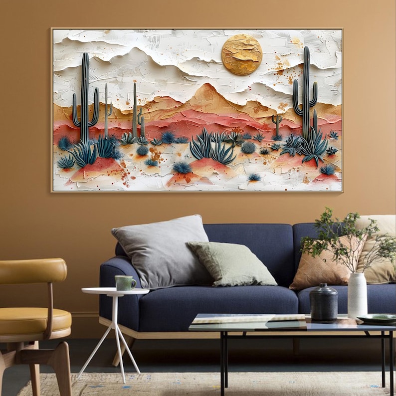 May include: A textured painting of a desert landscape with cacti, mountains, and a sun in the sky. The painting is in shades of brown, red, white, and gold.