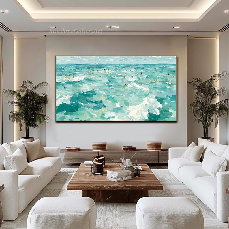 May include: Large rectangular painting depicting a turquoise ocean scene with numerous figures surfing or swimming. The artwork uses broad brushstrokes to create waves and a sense of movement. The sky is a pale blue, and the painting is framed in gold.
