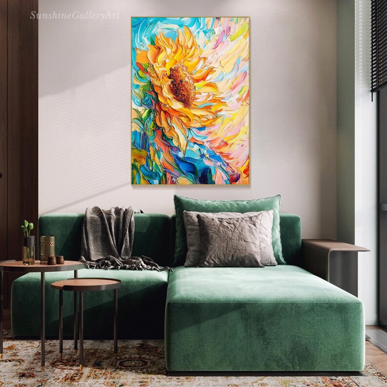 May include: A vibrant abstract painting of a sunflower with yellow petals and a brown center. The background is a mix of blue, green, pink, and yellow colors.