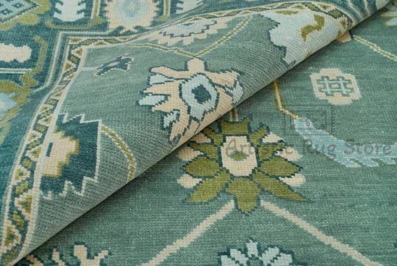 a close up of a blue and green rug