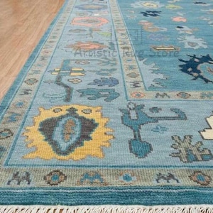 a blue area rug with a wooden floor
