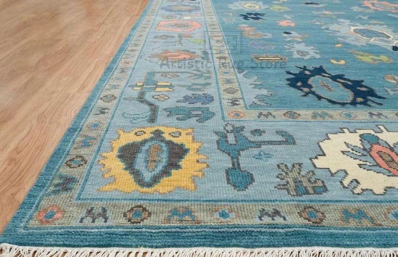 a blue area rug with a wooden floor