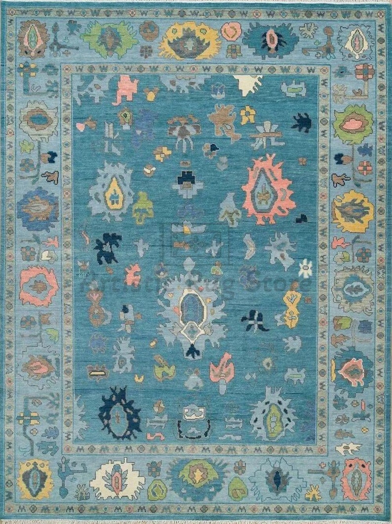 a blue rug with many different designs on it