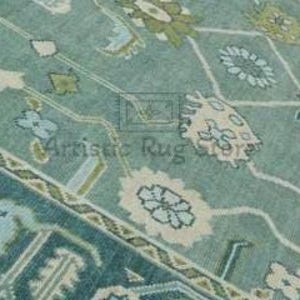 a close up of a rug with a blue background