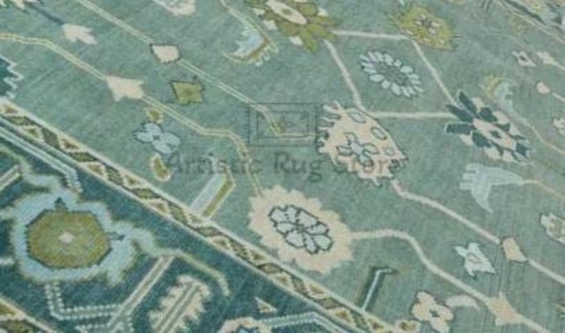 a close up of a rug with a blue background