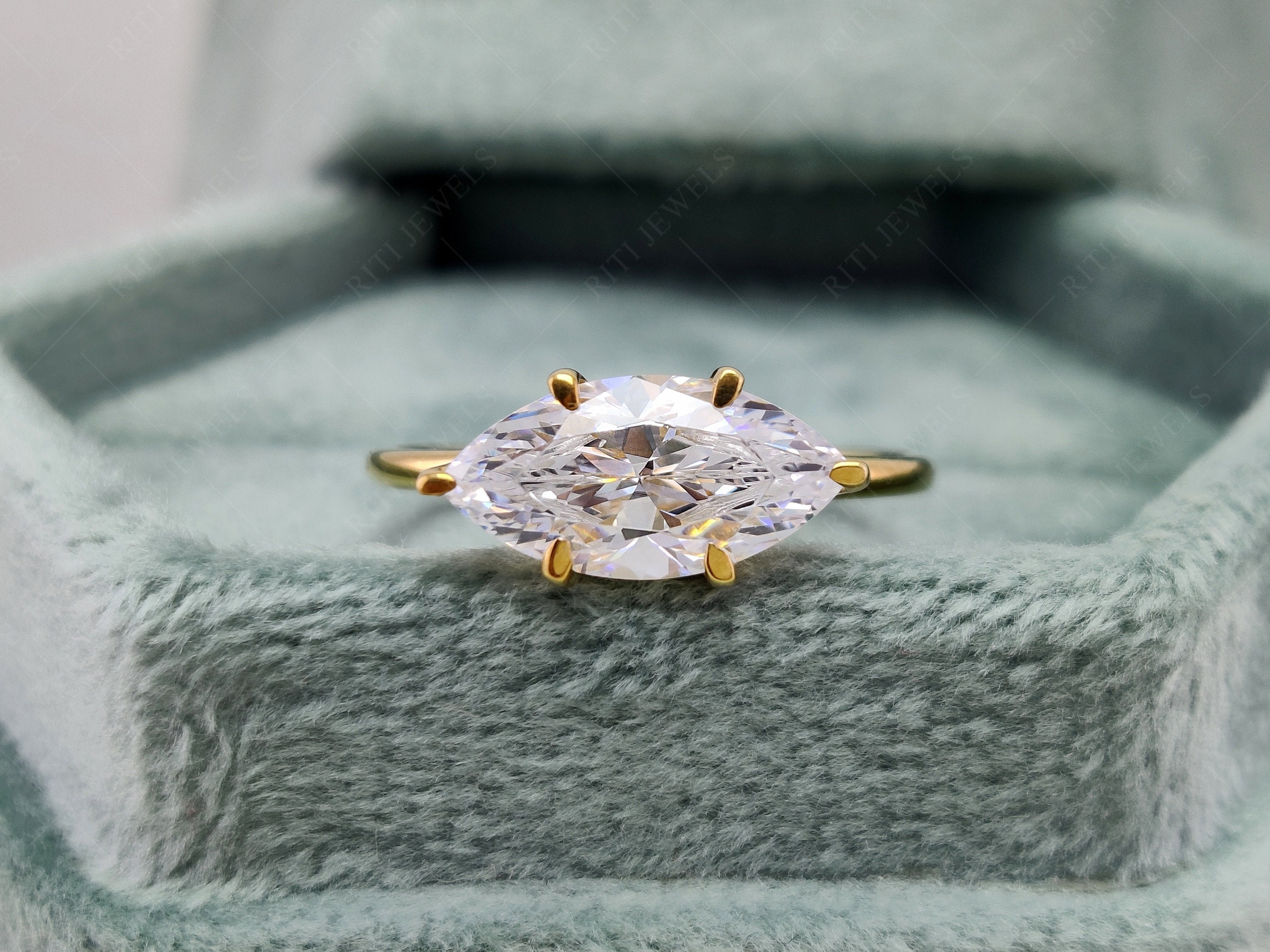 East west marquise halo deals