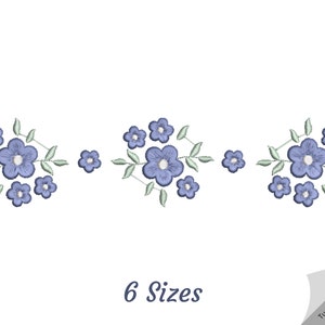 Pode incluir: Um design de bordado digital com um padrão repetitivo de flores azuis com folhas verdes. O design está disponível em seis tamanhos. Vire a imagem para ver os tamanhos.
