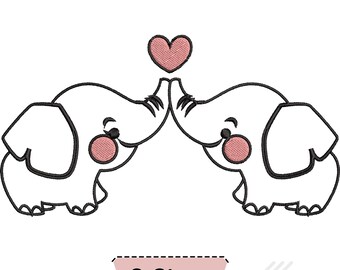 May include: An embroidery design featuring two white cartoon elephants facing each other with their trunks touching beneath a pink heart. The elephants have black outlines, pink circular cheeks, and long eyelashes. Text below reads 3 Sizes.