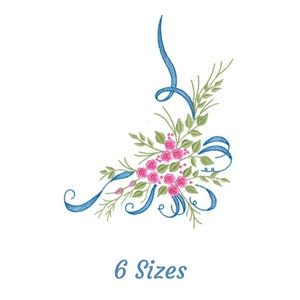 May include: Embroidered design featuring a corner bouquet of pink roses and green leaves with a blue ribbon. The design is available in 6 sizes.