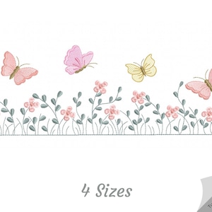May include: Embroidered design featuring a row of pink and yellow butterflies flying over a green leafy border with pink flowers. The design includes the text "4 Sizes".