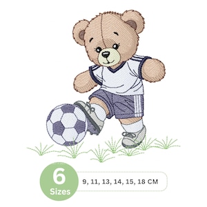 May include: An embroidered design of a teddy bear playing soccer. The bear wears a white and navy blue soccer uniform and kicks a soccer ball. The image includes the text "6 Sizes" and measurements in centimeters.