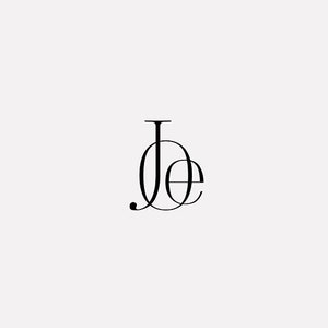 May include: A monogram logo with the letters "J" and "E" intertwined.