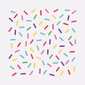 May include: A white background with a scattered pattern of colorful sprinkles. The sprinkles are in various shades of red, yellow, blue, green, pink, and purple.