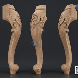May include: Three wooden furniture legs with intricate carvings. The legs are a light brown colour and have a curved shape. The carvings are detailed and ornate, and the legs are a beautiful example of craftsmanship.