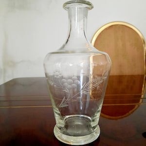 Glass decanter with engraving. Decanter for wine. Water jug.
