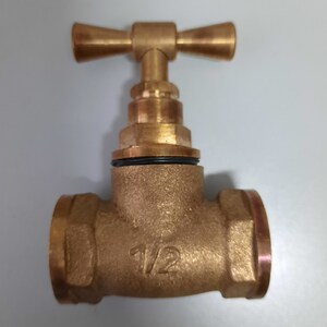 Old faucet. Brass faucet for water. Retro plumbing image 5