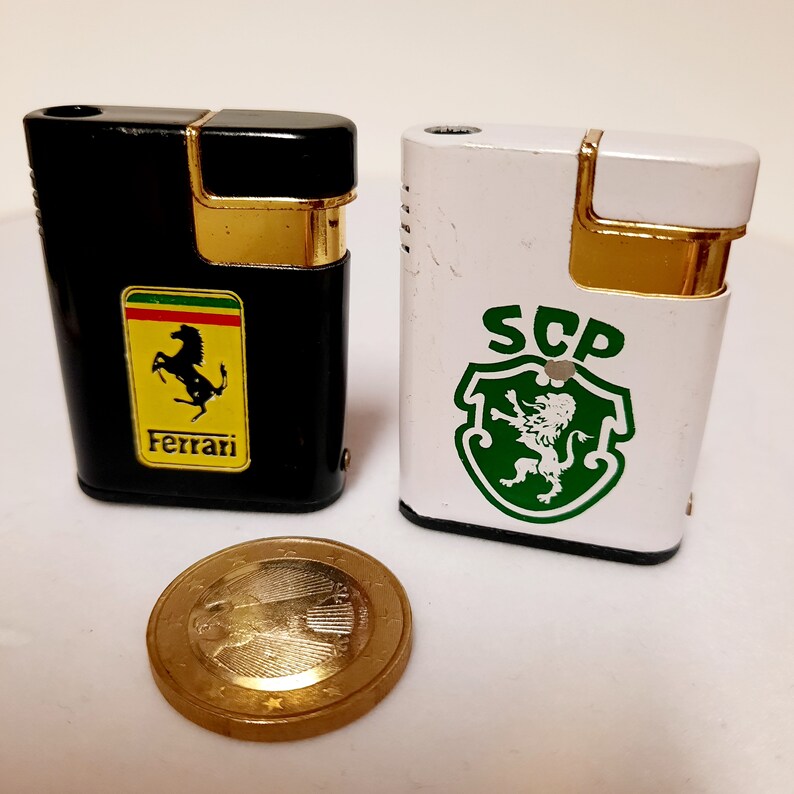 Vintage Lighters. Metal Lighters With Logos of Automobile Brands. Gas