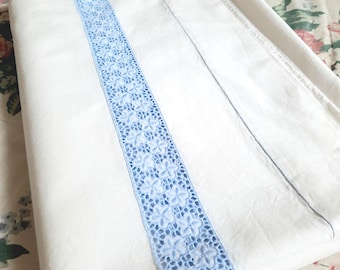 Vintage white 100% cotton sheet with decorative Richelieu embroidery on the edge. Bed skirt