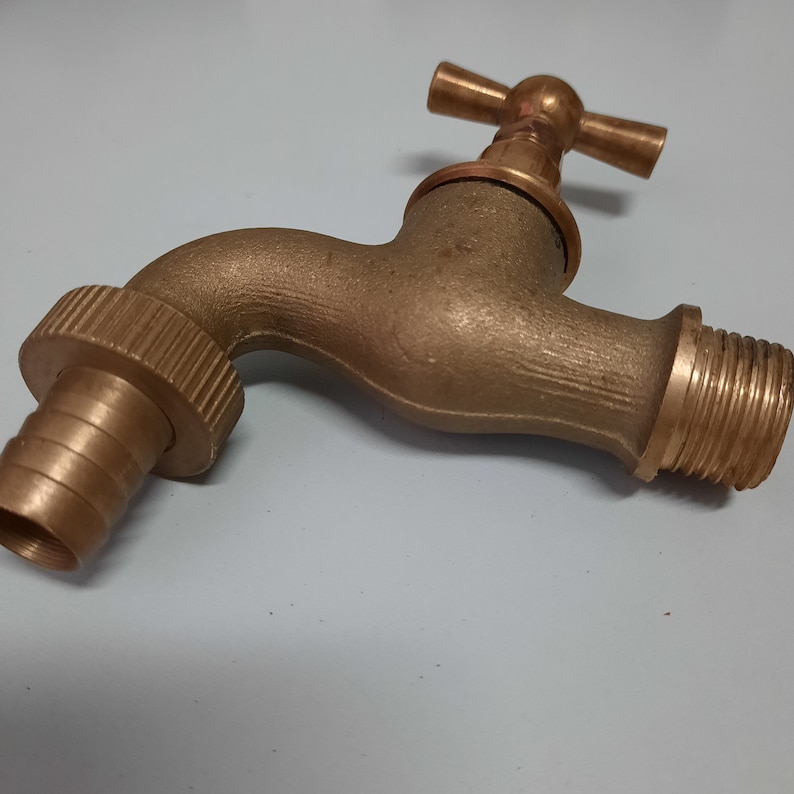 Old faucet. Brass faucet for water. Retro plumbing image 7