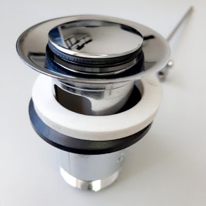 Sink drain. Solid brass drain, Push Up button.
