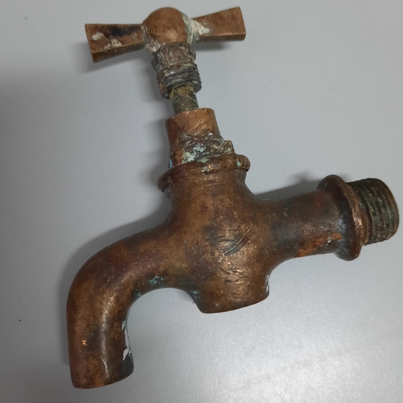 Old faucet. Brass faucet for water. Retro plumbing image 2