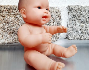 Vintage plastic doll. Toys. Naked dolls.