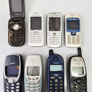 Lot of 8 Vintage Cell Phones: Sony Ericsson, Samsung, Trium, Nokia (Parts/Restoration)