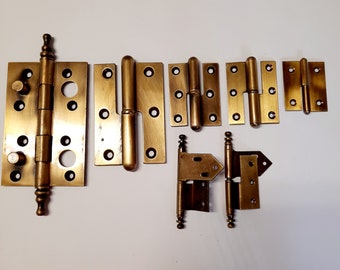 Door hinges are brass. Decorative door hinges in different sizes.  4.7", 3.9",2.5", 1,9"  solid brass portuguese door hinges.