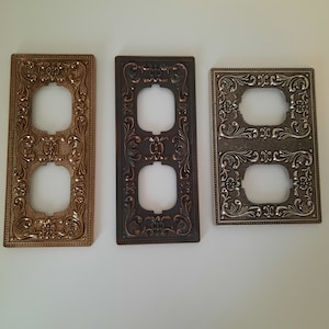 Switch cover. Decorative frame for sockets, switches. Metal plate for electrical outlet. Overlay.