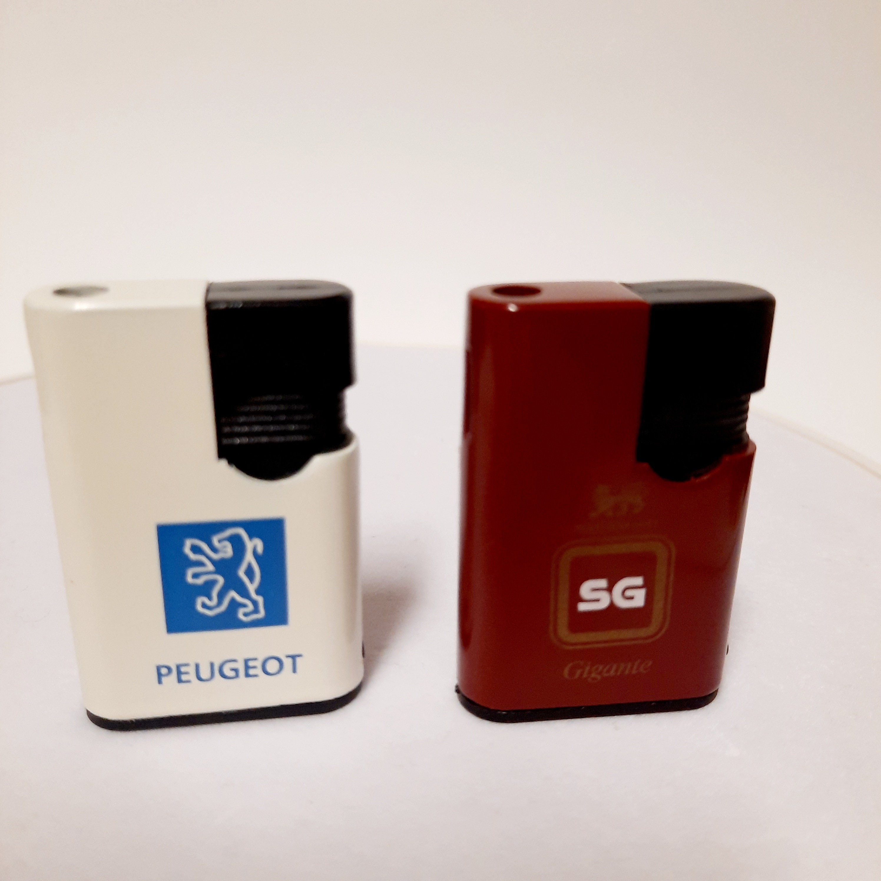 Vintage Lighters. Metal Lighters With Logos of Automobile Brands. Gas