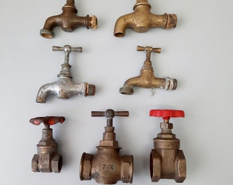 A set of brass faucets.Old faucet. Brass faucet for water. Retro plumbing.