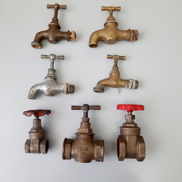 A set of brass faucets.Old faucet. Brass faucet for water. Retro plumbing.