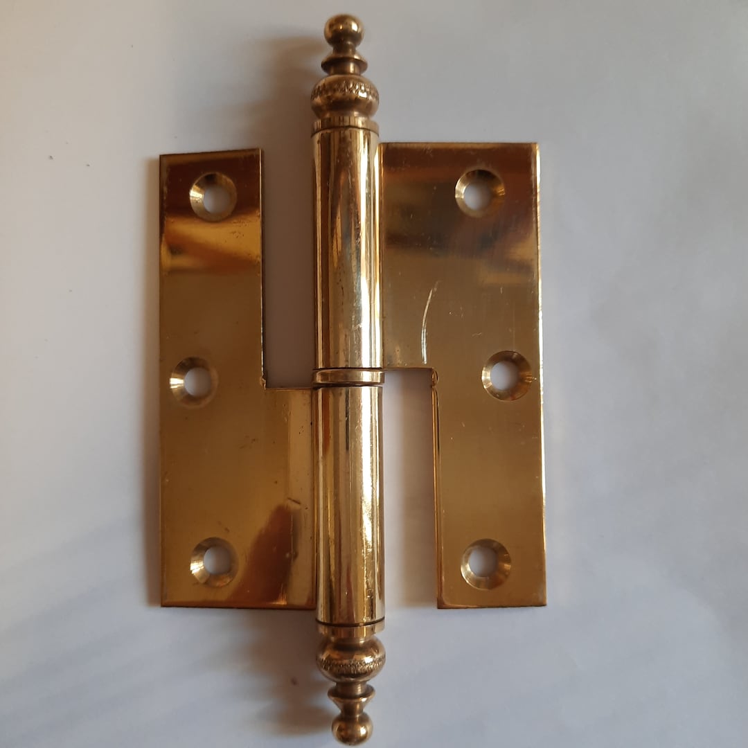 Door Hinges Are Brass. Decorative Door Hinges in Different Sizes. 3.9