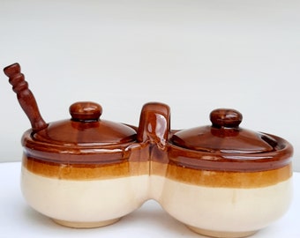 Set of two ceramic spice containers